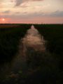 Zonsondergang met lucht weerspiegeling