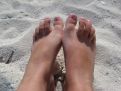 Feet in the sand