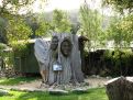 Maori faces carved in a tree