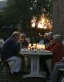 people drinking wine during sunset