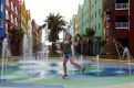 Leaping girl in fountain